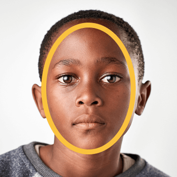 Boy with an oval like face shape