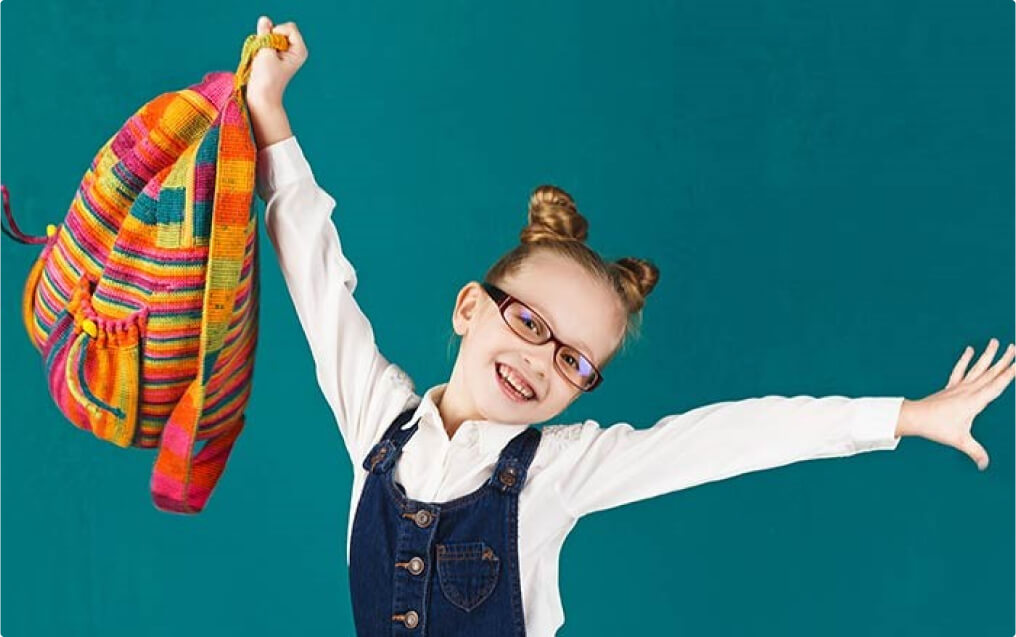 Happy girl wearing her eyeglasses