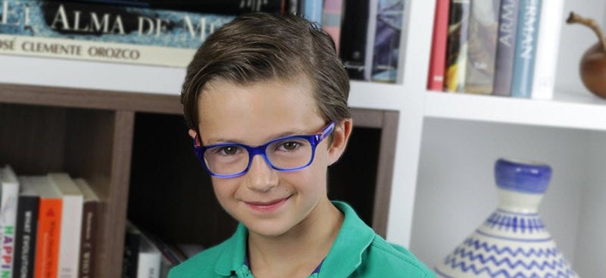 Cool boy wearing rectangular plastic eyeglasses